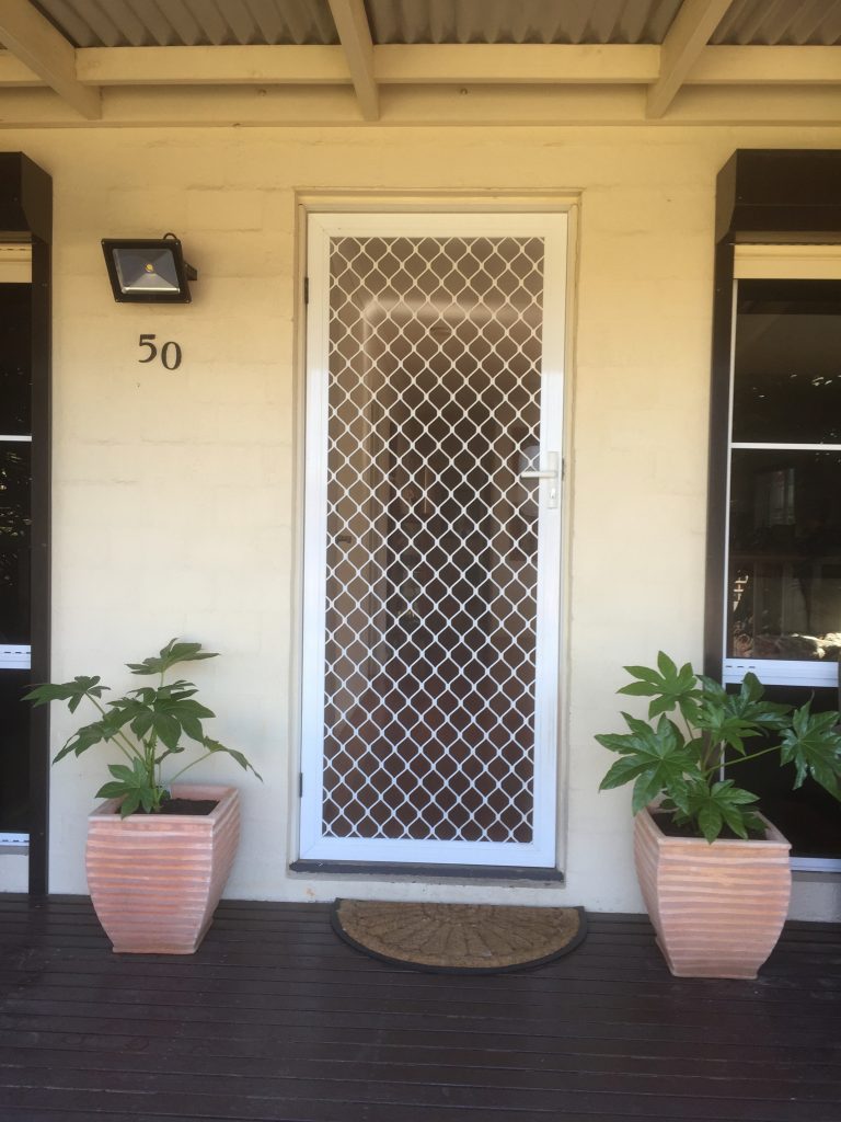 Old white screen door.