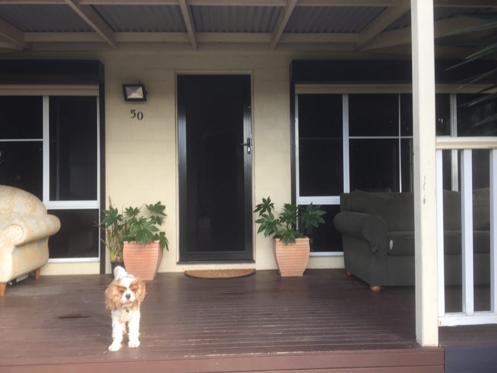 Jeff in front of the new front door.