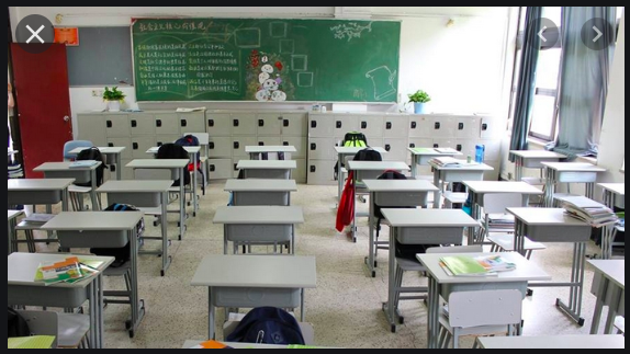 School desks in a rows.