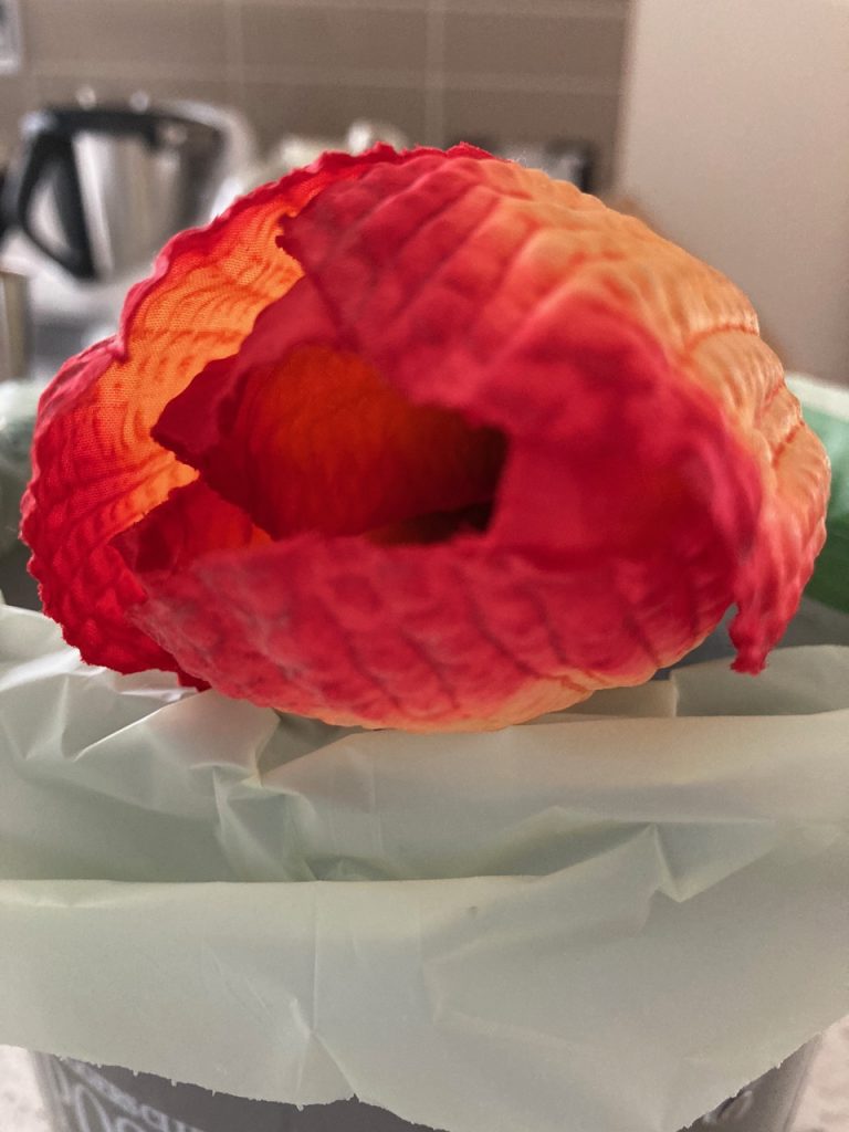 Pic of a red and orange fake flower