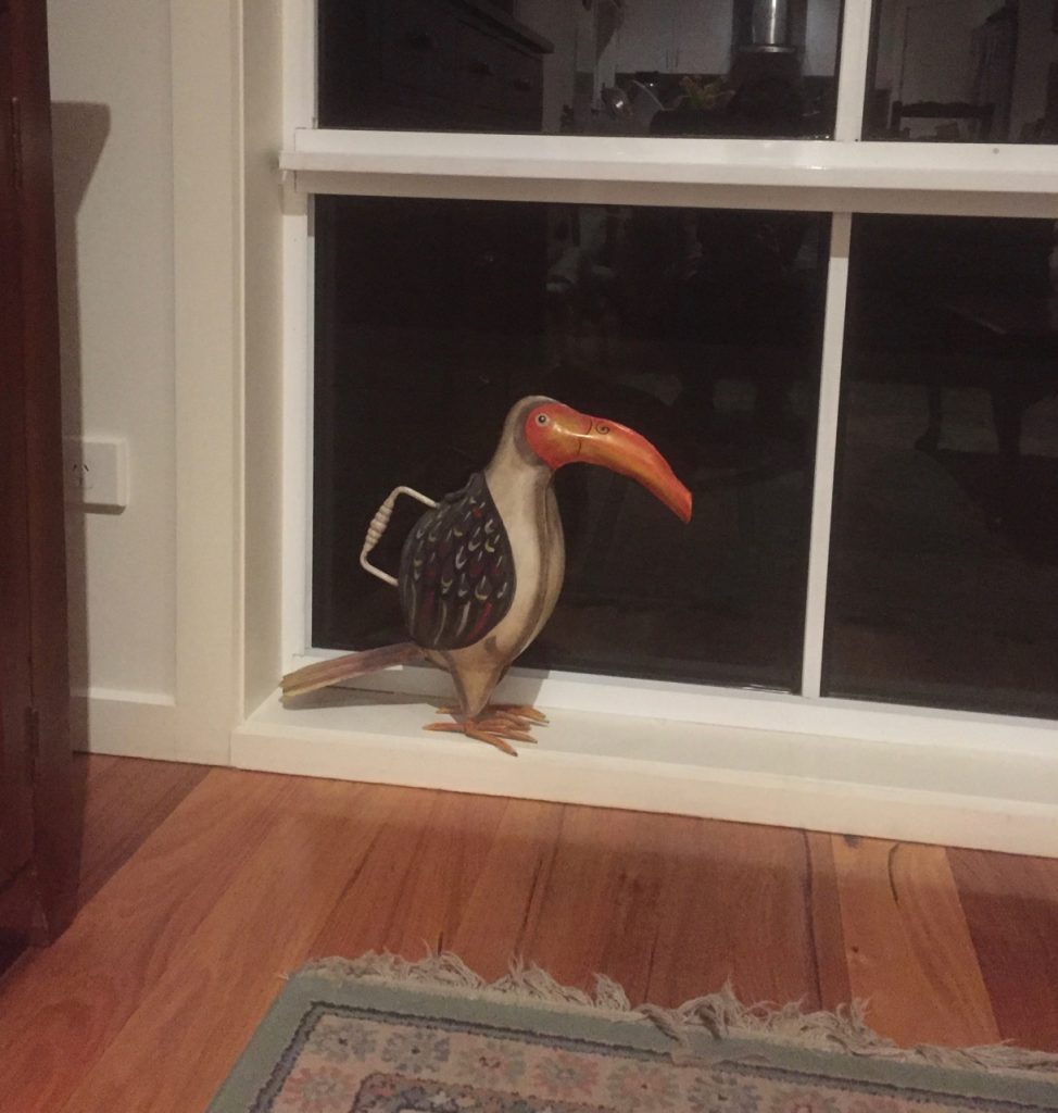 Long-billed bird watering can.